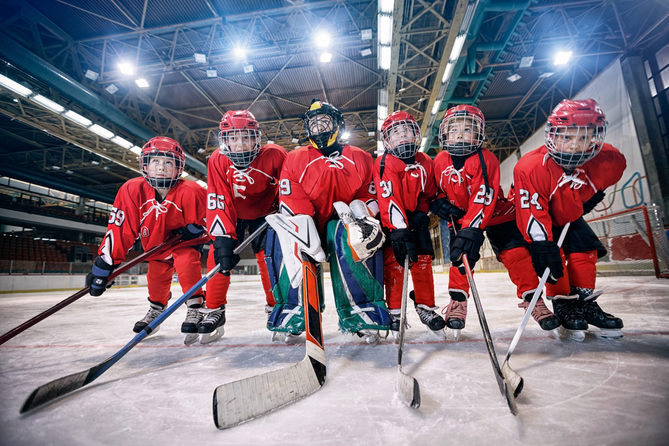 Youth hockey team - children play ice hockey